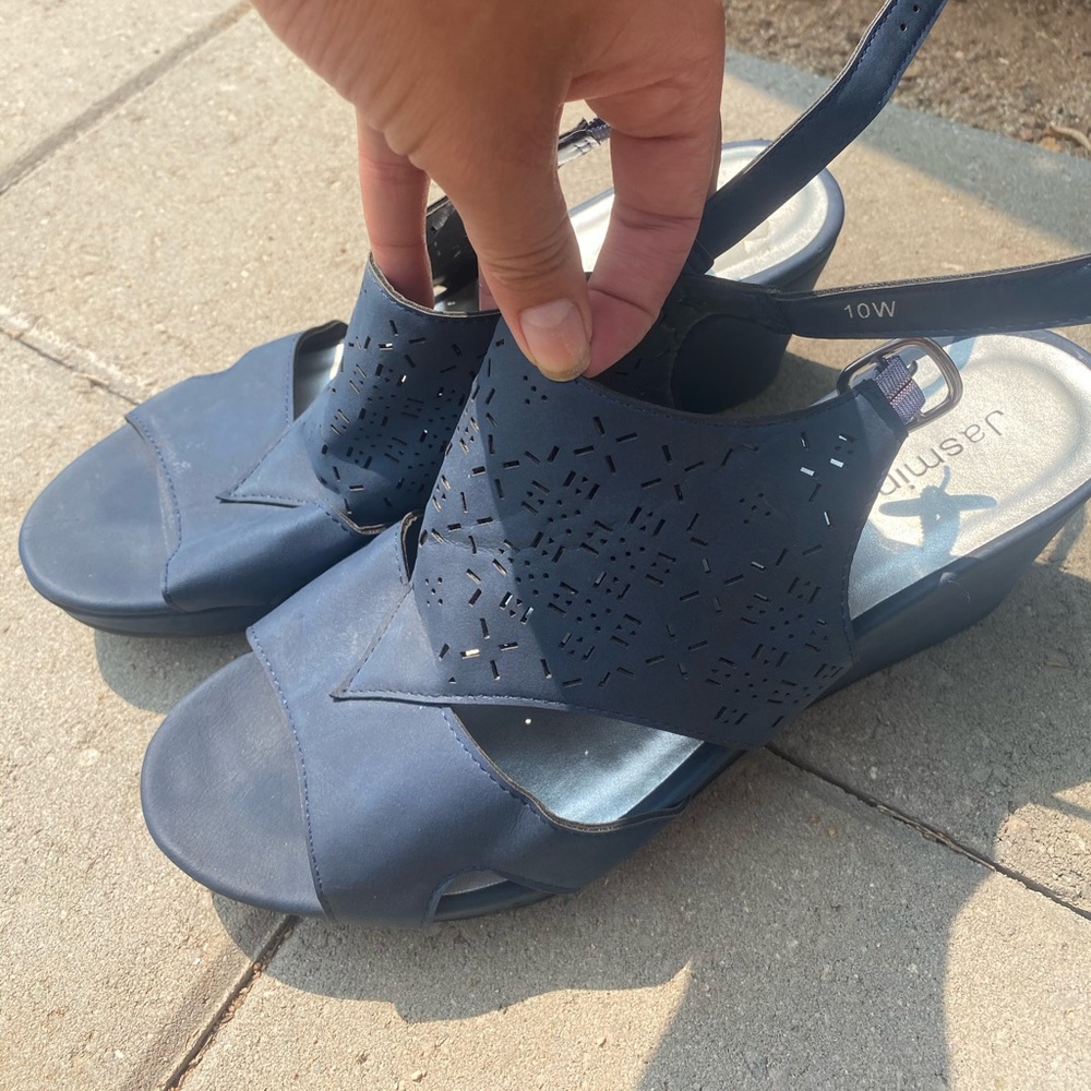 Navy blue wedge heels.